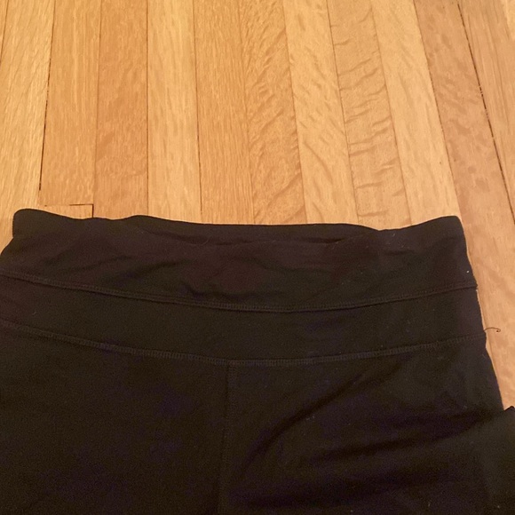 Black Lululemon capris pants with zippers - Picture 2 of 5